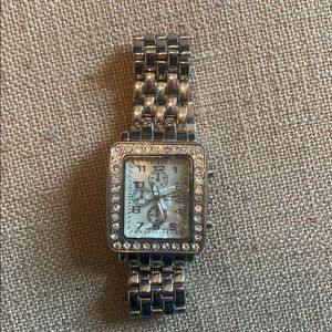 Cute silver watch with rhinestone detail